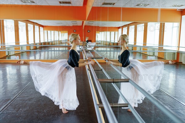 Ballerina practicing in ballet studio