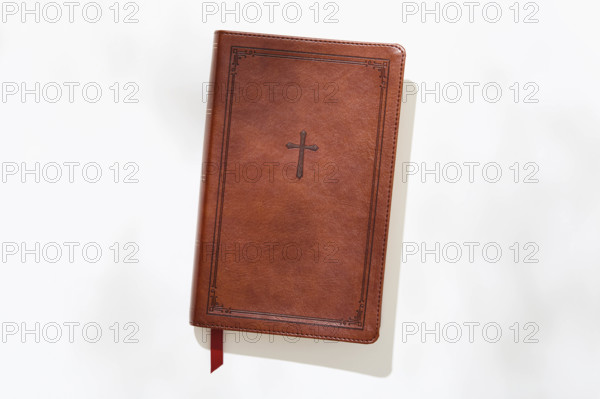 Studio shot of old bible on white background