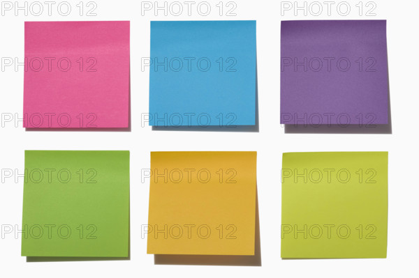 Colorful post it notes on white background