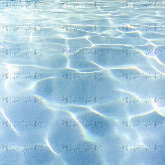 Sunlight reflecting on swimming pool water