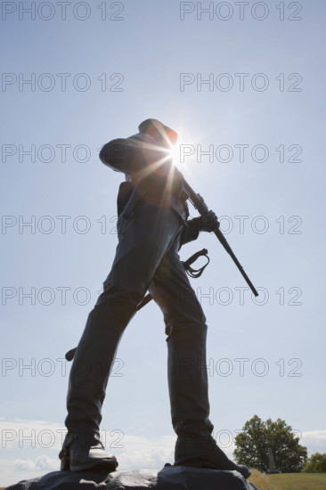 Sun shining behind 2nd Pennsylvania Cavalry statue
