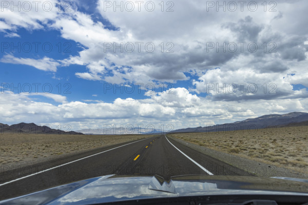 USA, Nevada, Henderson, Empty road and clouds seen from car