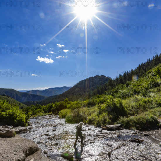 USA, Utah, Sundance, Woman hiking in landscape on sunny day