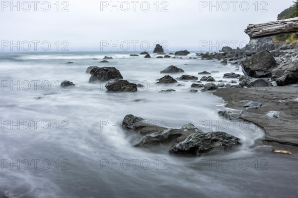 USA, Oregon, Brookings, Sea waves on rocky coast, long exposure