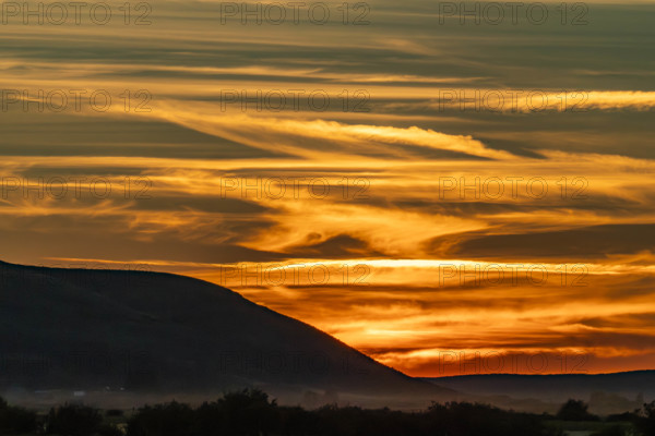 USA, Idaho, Bellevue, Silhouette of hill against sky at sunset