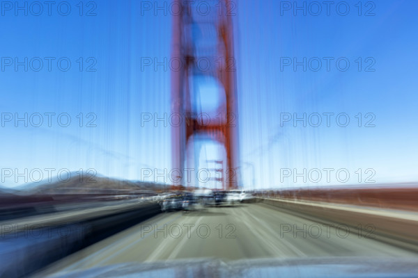 USA, California, San Francisco, Motion blur image driving across Golden Gate Bridge