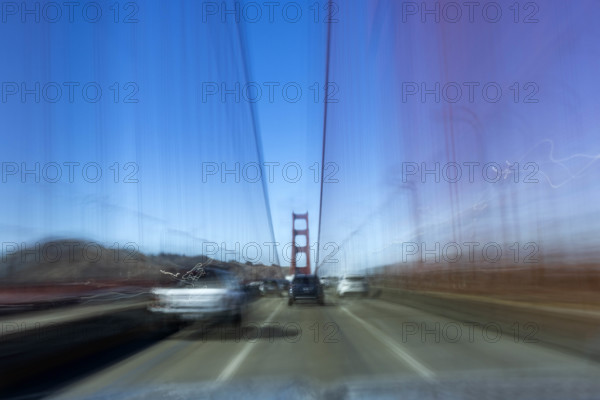 USA, California, San Francisco, Motion blur image driving across Golden Gate Bridge