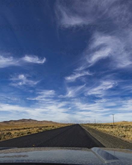 USA, Nevada, Winnemucca, Empty desert highway seen from car