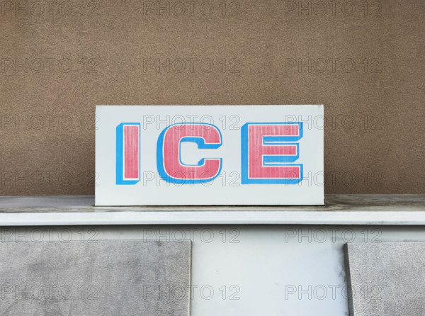 Close-up of ice machine outside convenience store