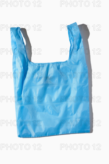 Blue reusable totebag on white background