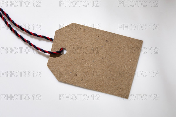 Blank sale tag on white background