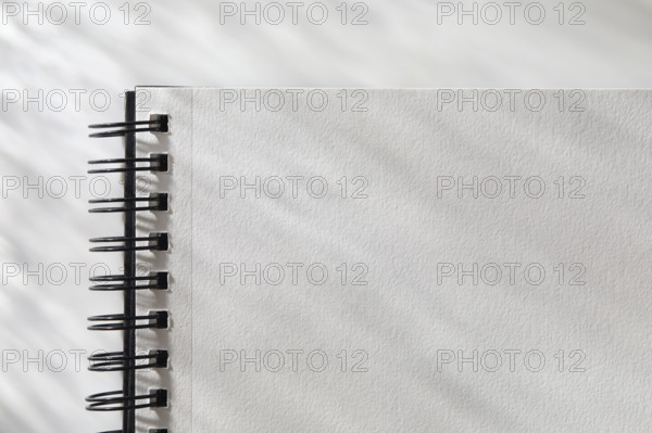 Close-up of open  spiral notebook