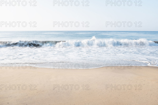 Mexico, Oaxaca State, Puerto Escondido, Costa Chica, Ocean waves washing empty beach
