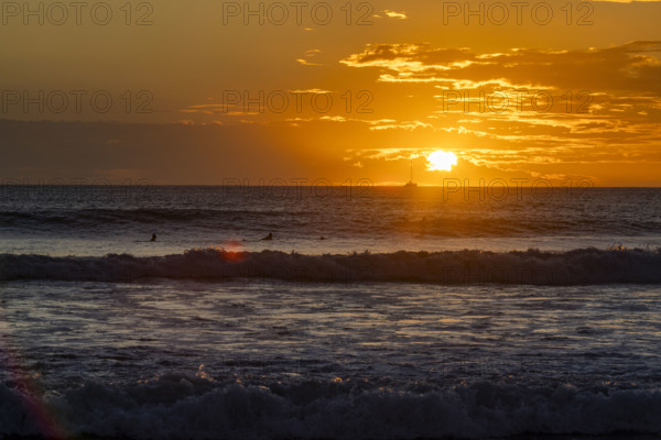 Costa Rica, Guanacaste, Playa Flamingo, Dramatic sky above sea at sunset