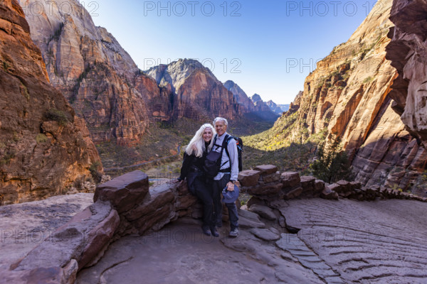 USA, Utah, Zion National Park, Portrait of senior couple on trail to Angels Landing
