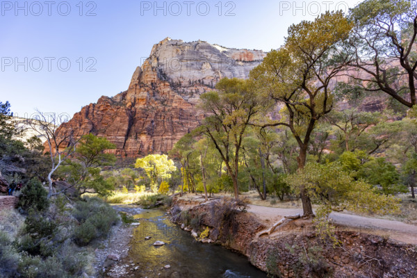 USA, Utah, Zion National Park, Virgin River and rock formations on sunny day