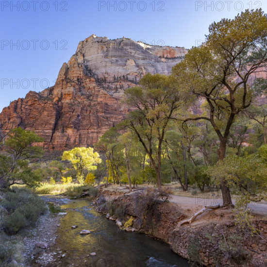 USA, Utah, Zion National Park, Virgin River and rock formations on sunny day
