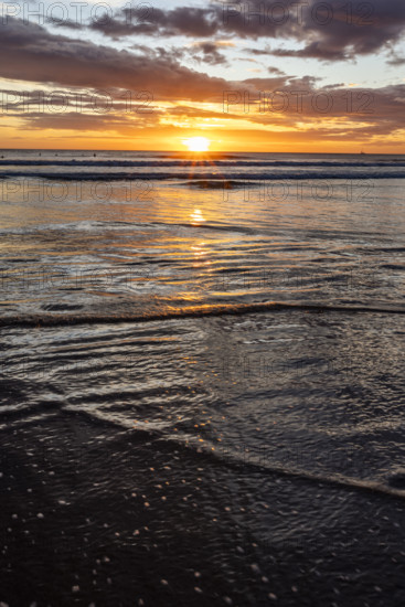 Costa Rica, Guanacaste, Playa Grande, Calm ocean waves on Playa Grande sunset