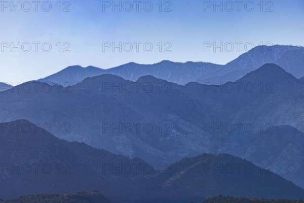 USA, Utah, LaVerkin, Silhouettes of mountain ranges against clear blue sky