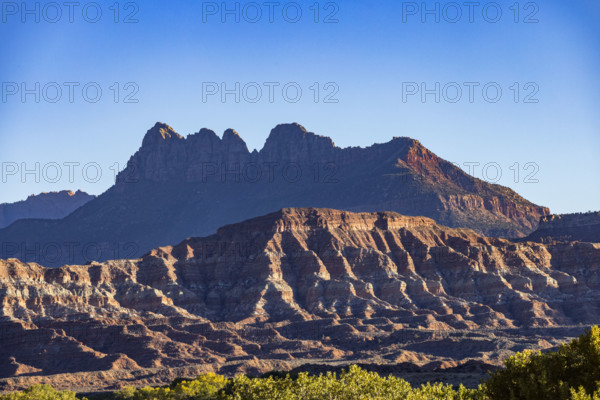 USA, Utah, Springdale, Cliff formations near Zion National Park on sunny day