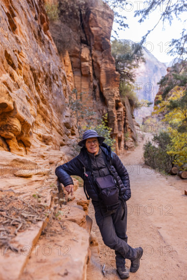 USA, Utah, Zion National Park, Portrait of smiling man on Angels Landing Trail