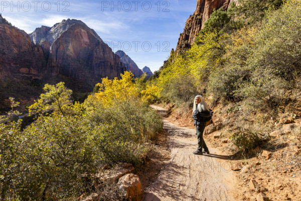 USA, Utah, Zion National Park, Portrait of smiling woman on Angels Landing Trail