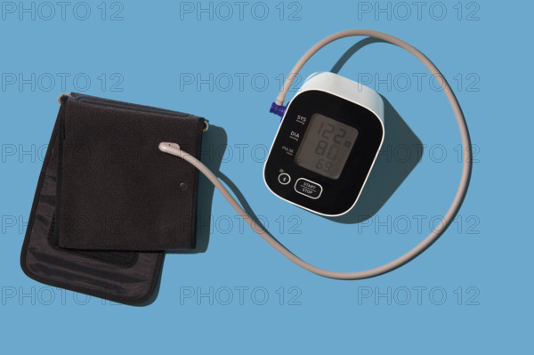 Blood pressure gauge on blue background