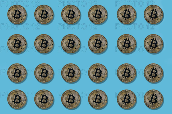 Multiple bitcoin on blue background