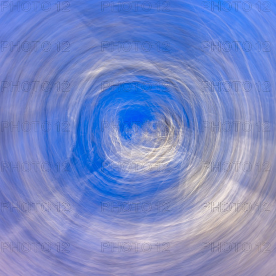 Intentional camera movement blur of snowy road