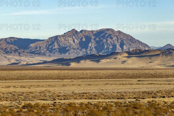 USA, California, Baker, Desert landscape with rocky mountain