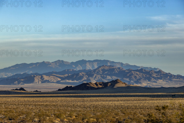 USA, California, Baker, Desert landscape with rocky mountain
