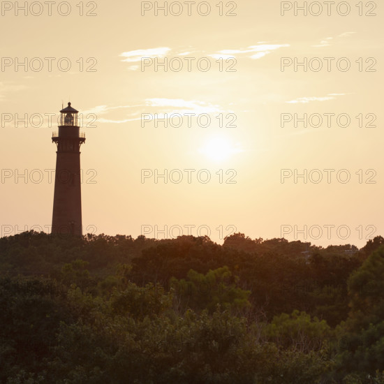 USA, North Carolina, Corolla, Currituck Lighthouse silhouette at sunset