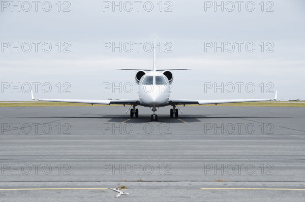 Private jet on airport tarmac. Nantucket, Massachusetts, USA.