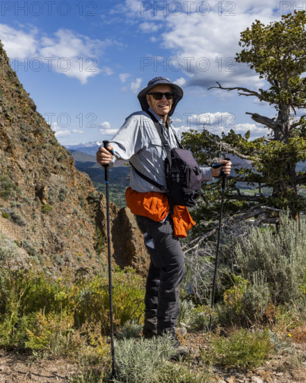 Portrait of smiling man on Carbonate Mountain trail. Hailey, Idaho, USA.