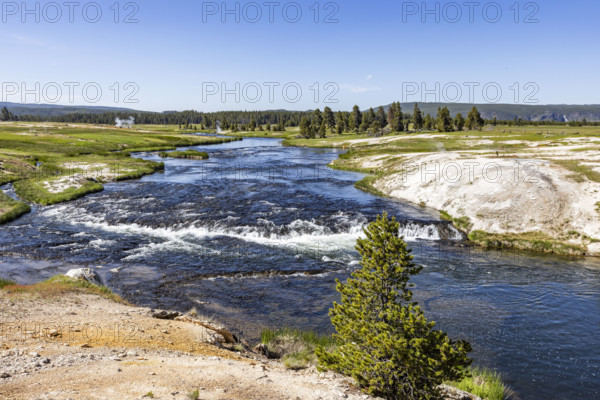 Firehole River on sunny day. , Wyoming, USA.