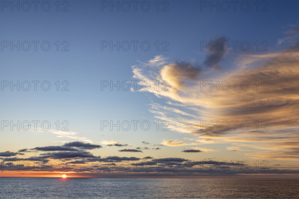 Clouds above ocean at sunset. La Jolla, California, USA.
