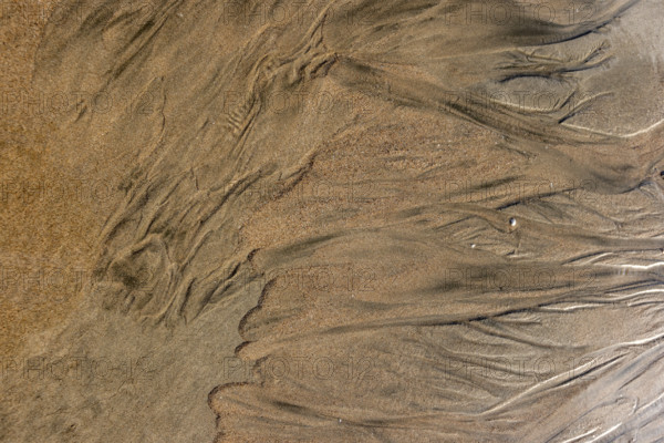 Abstract patterns on beach sand. , Guanacaste, Costa Rica.