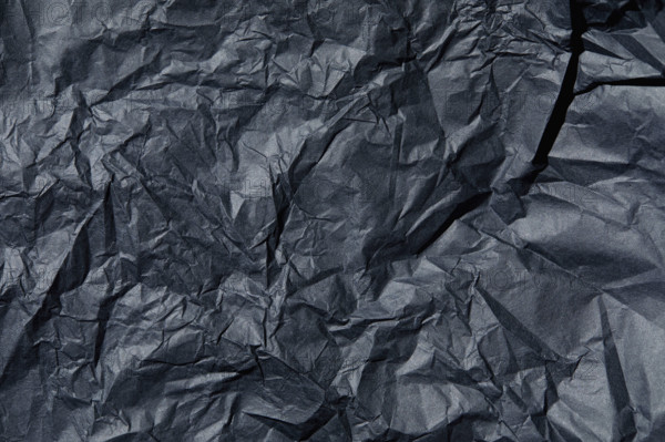 Close-up of wrinkled black tissue paper. New York City, New York State, USA.