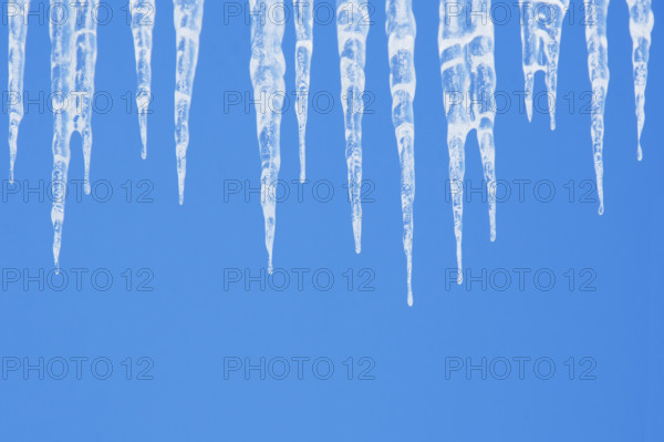Icicles against clear blue sky. Nashville, Tennessee, USA.