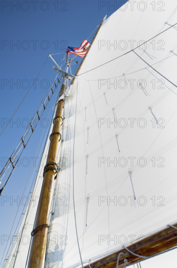 Low angle view of wood sailboat mast. Nantucket, Massachusetts, USA.