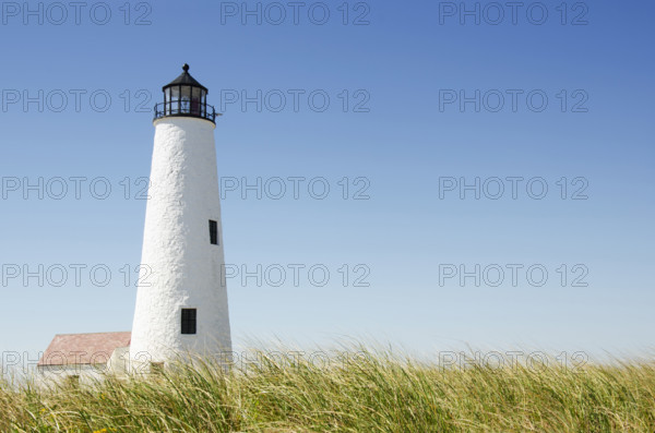 Great Point Lighthouse against clear sky, Nantucket, Massachusetts, USA.