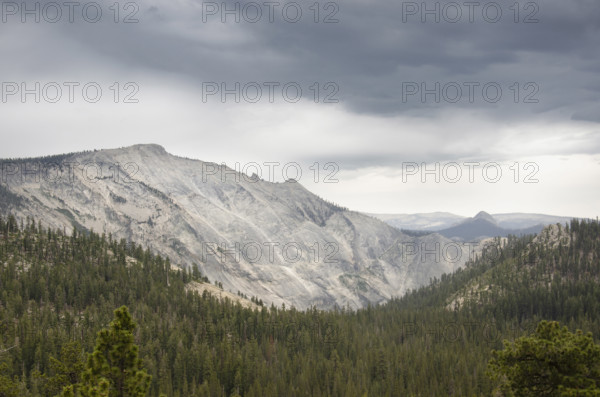 Storm clouds gathering over Yosemite National Park, Tuolumne Meadows, California, USA.