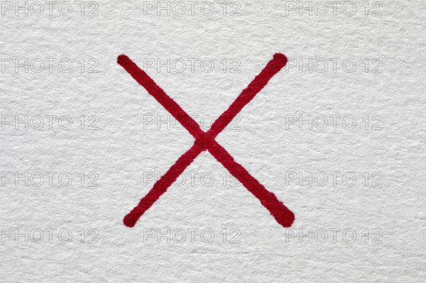 Red letter X on white background, New York City, New York, USA.