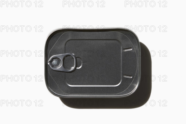 Tin of sardines on white background, New York City, New York, USA.