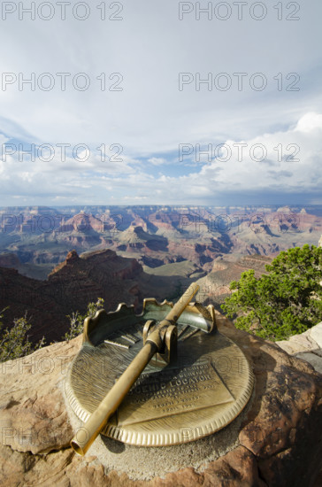 Telescope set on rock in South Rim of the Grand Canyon National Park, Grand Canyon Village, Arizona, USA.