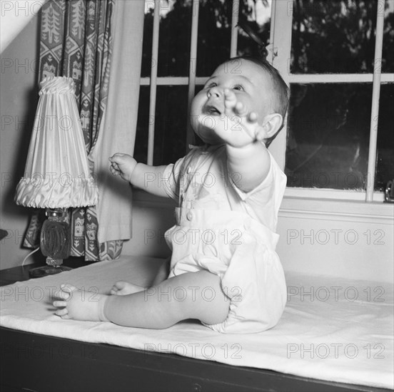 Tubby Block's baby. Interior shot of Tubby Block's baby. Kenya, 30 August 1954. Kenya, Eastern Africa, Africa.