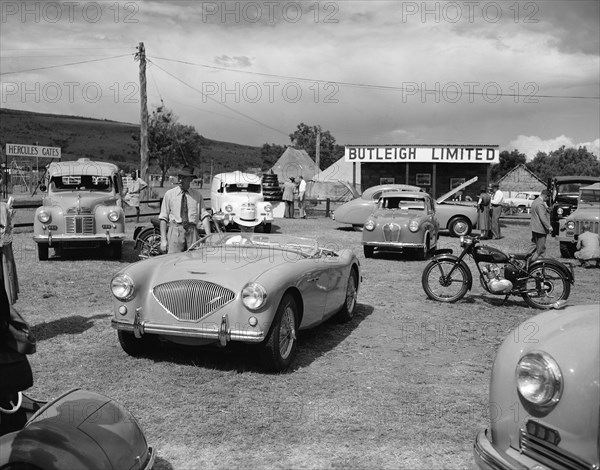 Butleigh Ltd. Butleigh Ltd at the Royal Show. A range of vehicles including cars and motorcycles are on display. Nakuru, Kenya, 1 October 1954. Nakuru, Rift Valley, Kenya, Eastern Africa, Africa.