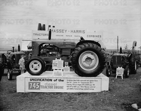 745 diesel tractor engine. A Massey-Harris 745 diesel tractor engine on display on the Massey-Harris stand at the Royal Show. Nakuru, Kenya, 1 October 1954., Eastern Africa, Africa.