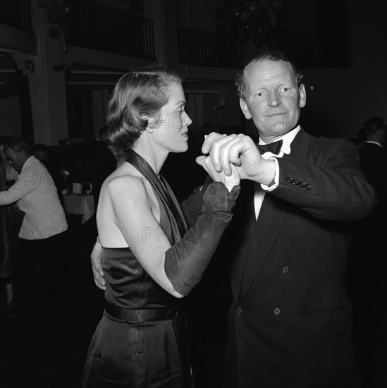 Motor sports dance. A formally dressed couple dancing at the motor sports dance and prize presentation evening. Kenya, 26 November 1954. Kenya, Eastern Africa, Africa.