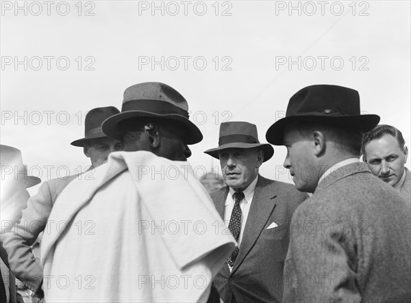 Littleton and Chief Makimei. A Western official identified as 'Littleton' meets with Chief Makemei. Kenya, 16 May 1953. Kenya, Eastern Africa, Africa.